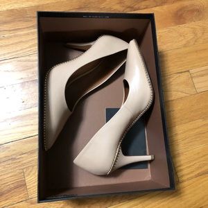 New nude Coach pumps with gold details